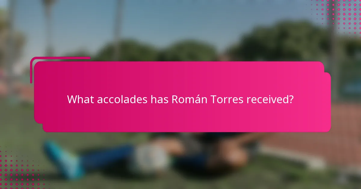 What accolades has Román Torres received?